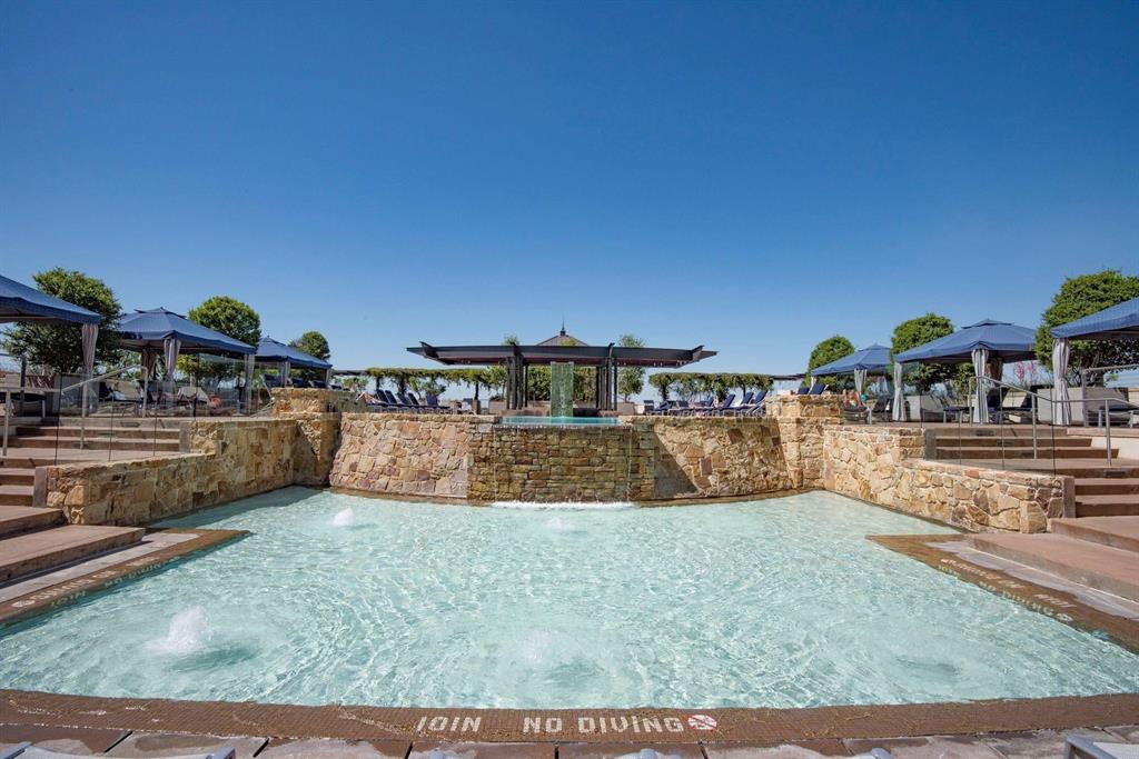 2600 West 7th Street, Unit 1807 Fort Worth, TX 76107 - Photo 1 of 27 a view of swimming pool with outdoor seating