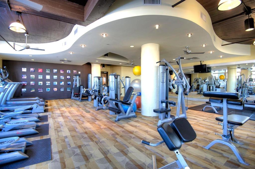 2600 West 7th Street, Unit 1807 Fort Worth, TX 76107 - Photo 21 of 27 a view of a room with gym equipment