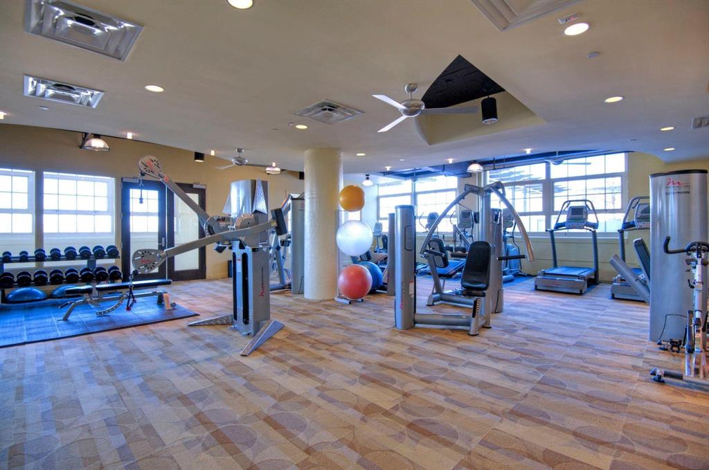 2600 West 7th Street, Unit 1807 Fort Worth, TX 76107 - Photo 22 of 27 a view of a room with gym equipment