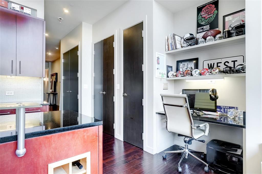 2600 West 7th Street, Unit 1807 Fort Worth, TX 76107 - Photo 7 of 27 a view of workspace with wooden floor shelves