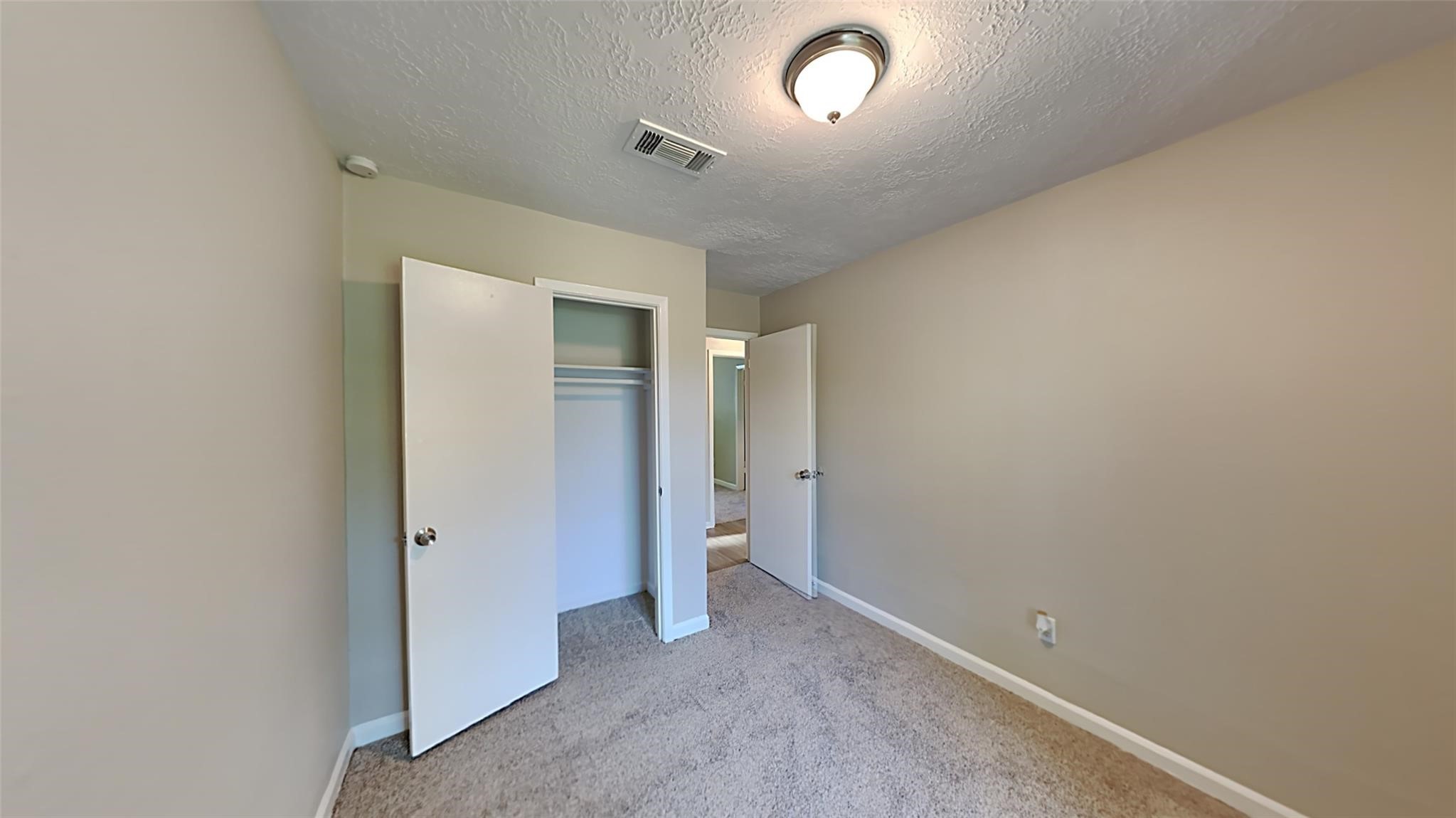 6706 Castleview Lane Houston, TX 77489 - Photo 12 of 17 an empty room with a elevator