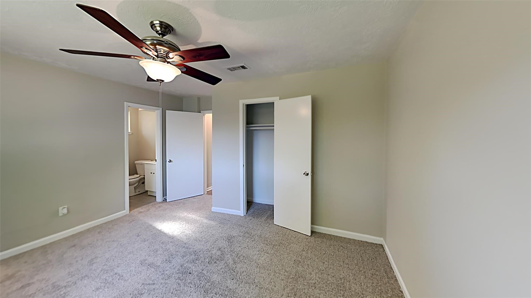 6706 Castleview Lane Houston, TX 77489 - Photo 9 of 17 a view of a livingroom with a fan