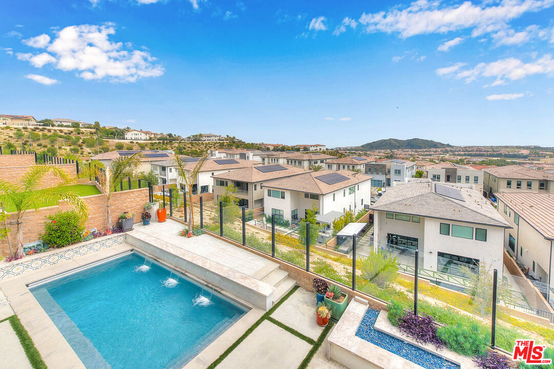 20558 Overlook Court Porter Ranch, CA 91326 - Photo 28 of 48 a view of a swimming pool with an ocean view