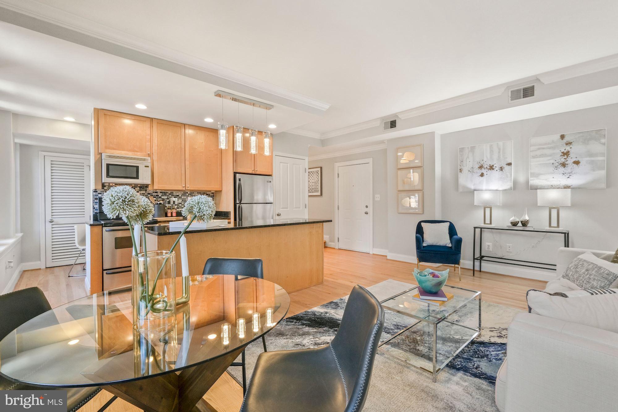 1701 16th Street Northwest, Unit 316 Washington, DC 20009 - Photo 15 of 42 Open living, dining, & kitchen