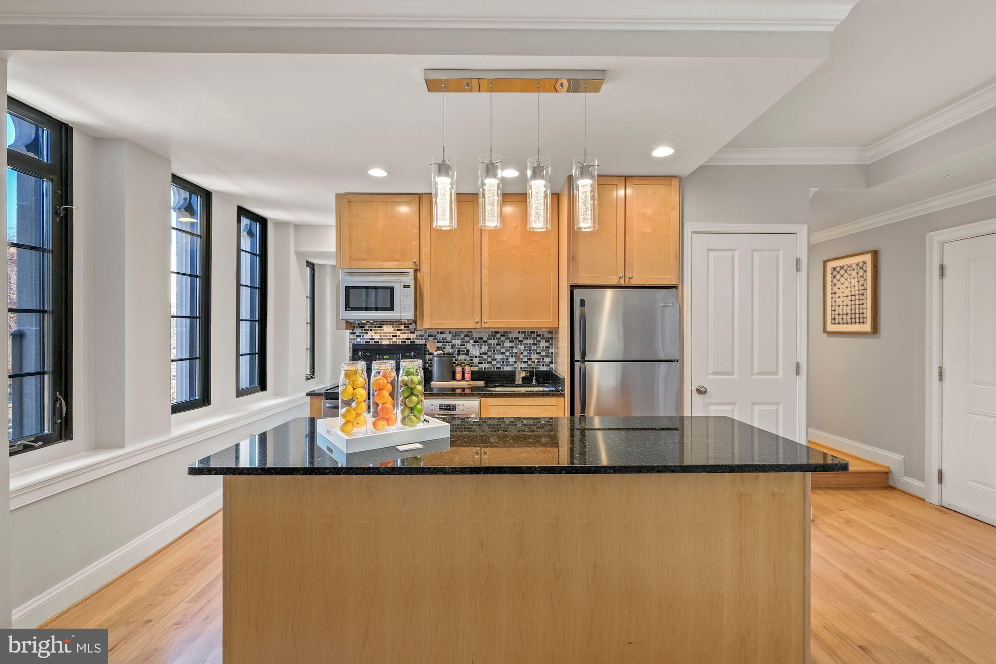 1701 16th Street Northwest, Unit 316 Washington, DC 20009 - Photo 17 of 42 Expansive kitchen island