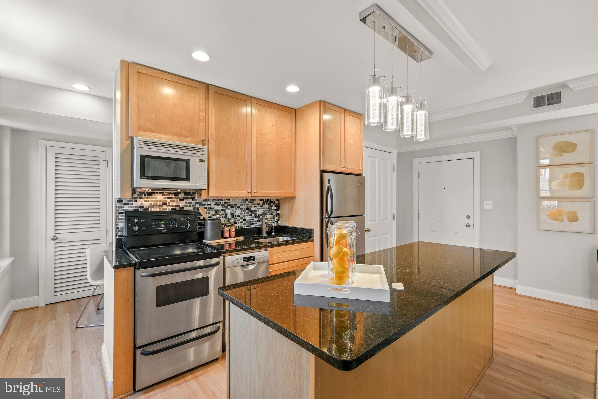 1701 16th Street Northwest, Unit 316 Washington, DC 20009 - Photo 18 of 42 42" maple kitchen cabinets