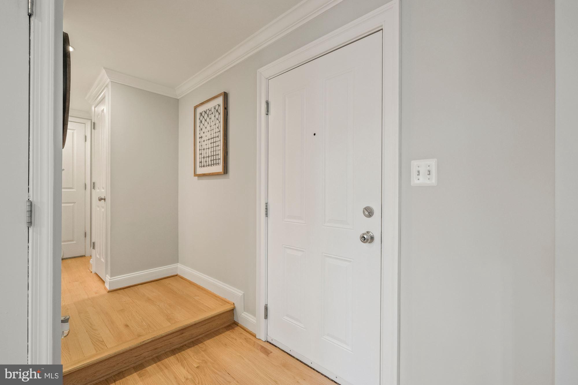 1701 16th Street Northwest, Unit 316 Washington, DC 20009 - Photo 7 of 42 Entry foyer w/coat closet