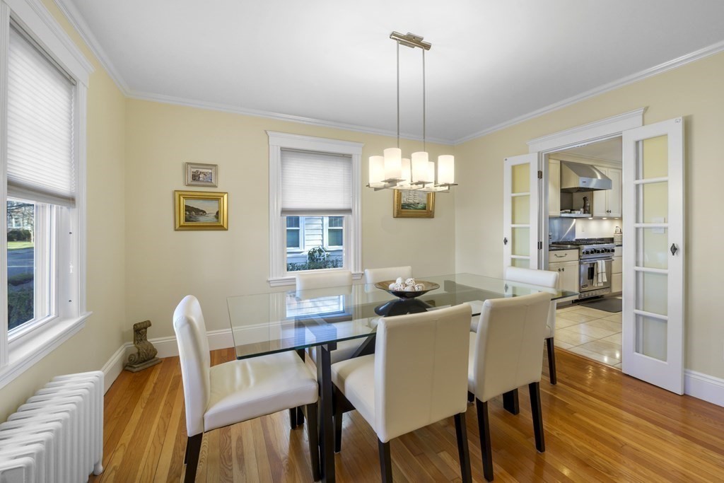 14 Homestead Road Marblehead, MA 01945 - Photo 13 of 41 a view of a dining room with furniture wooden floor and chandelier