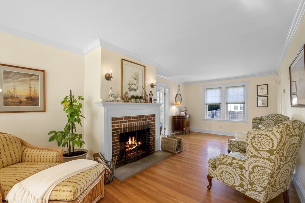 14 Homestead Road Marblehead, MA 01945 - Photo 18 of 41 a living room with furniture and a fireplace