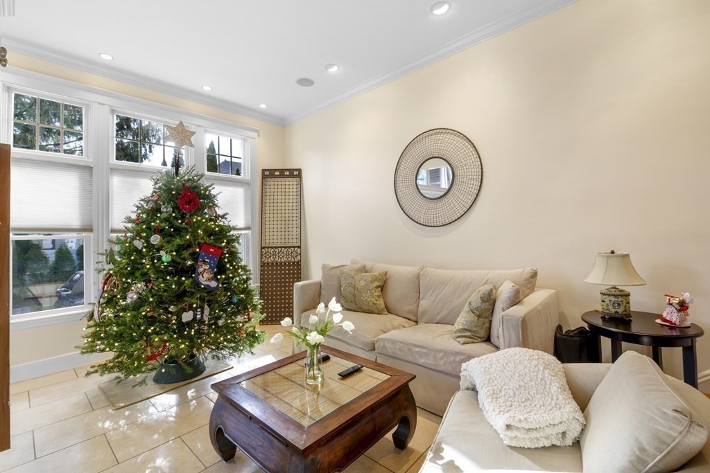 14 Homestead Road Marblehead, MA 01945 - Photo 19 of 41 a living room with furniture and a potted plant