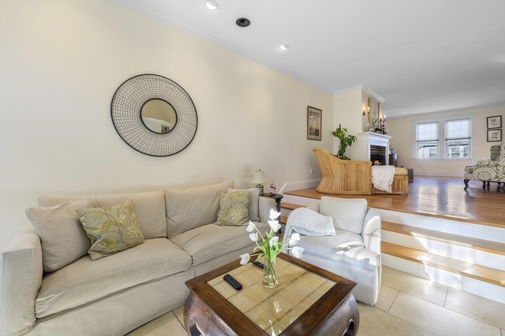 14 Homestead Road Marblehead, MA 01945 - Photo 20 of 41 a living room with furniture a rug and a floor to ceiling window
