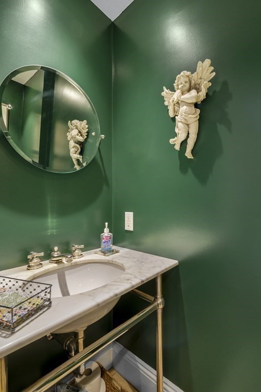 14 Homestead Road Marblehead, MA 01945 - Photo 30 of 41 a bathroom with a sink and mirror