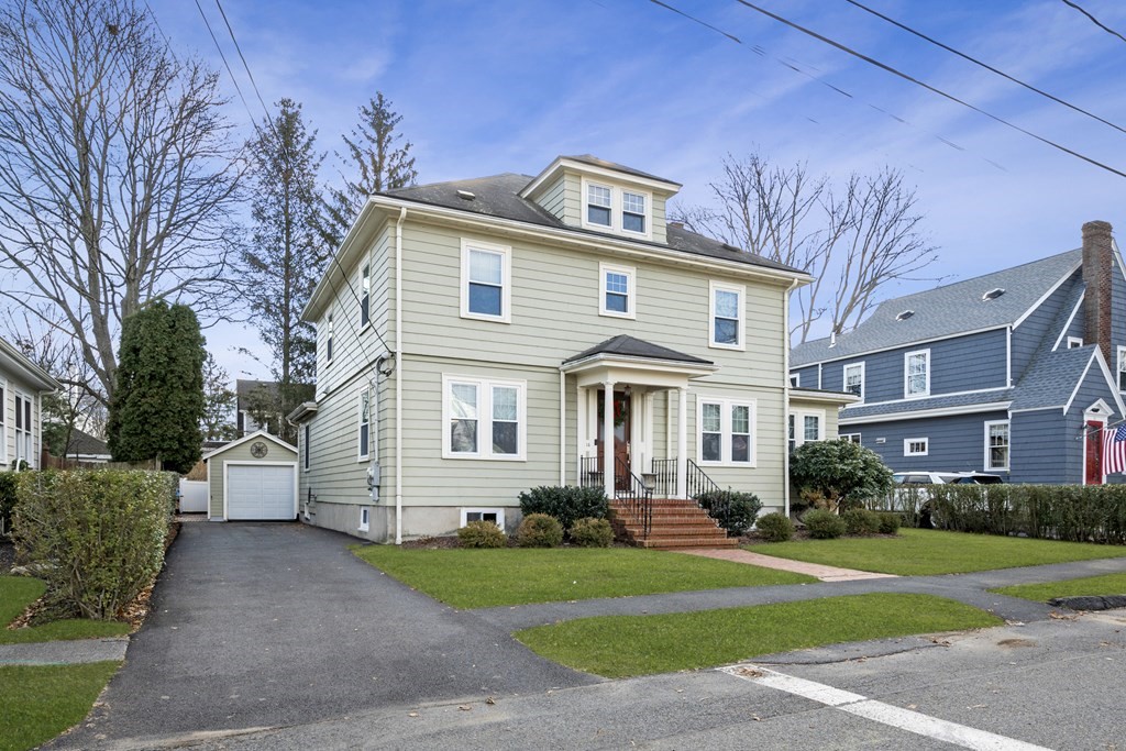 14 Homestead Road Marblehead, MA 01945 - Photo 3 of 41 a front view of a house with a garden