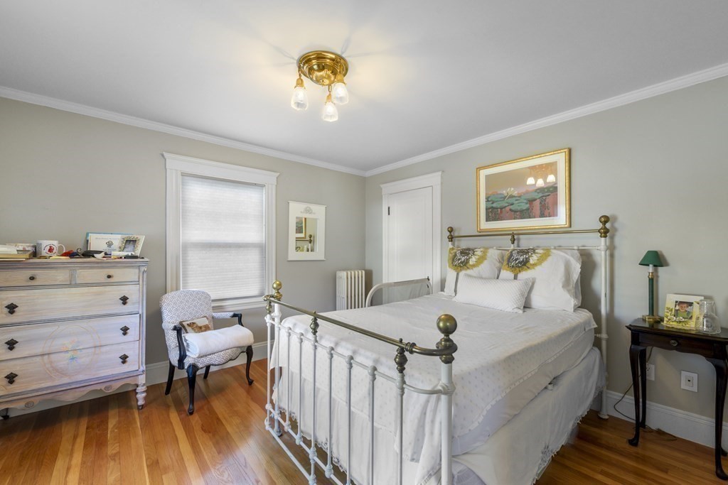 14 Homestead Road Marblehead, MA 01945 - Photo 36 of 41 a bed room with a bed and a table