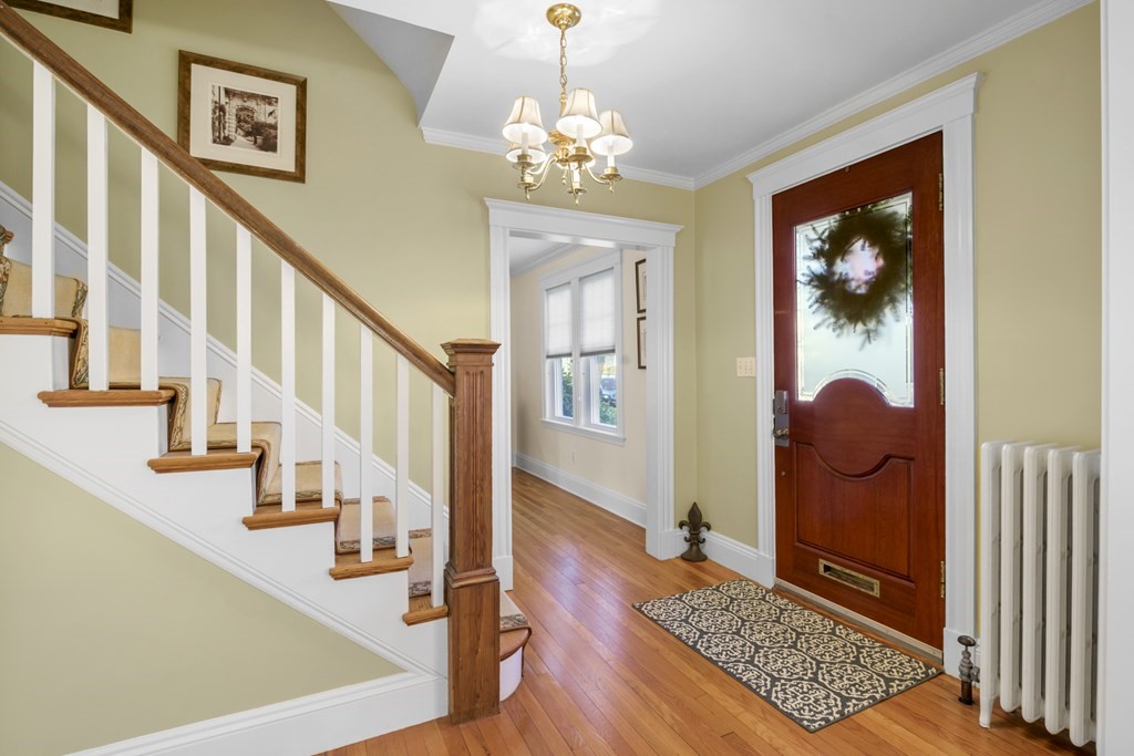 14 Homestead Road Marblehead, MA 01945 - Photo 10 of 41 a view of a hallway with wooden floor and stairs