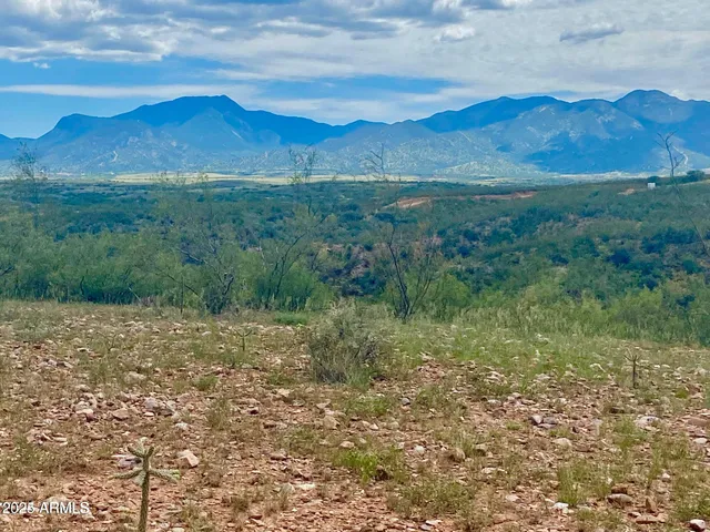 a view of an outdoor space with mountain view