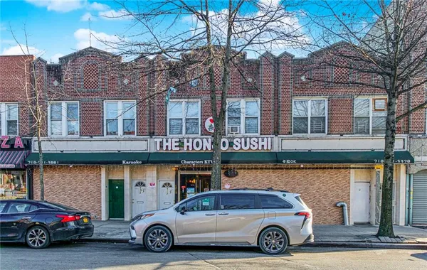 a car parked in front of a building