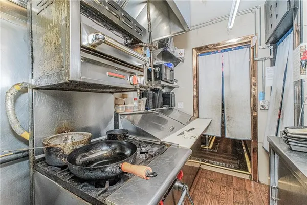 a view of a balcony with sitting area