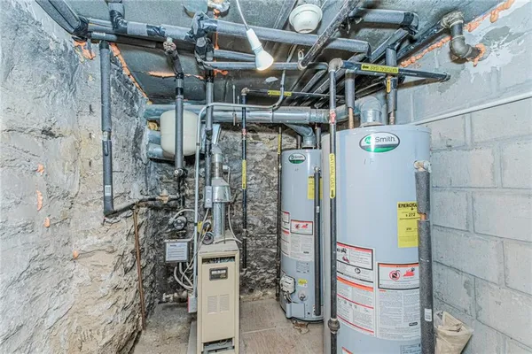 a bathroom with a sink toilet and a mirror