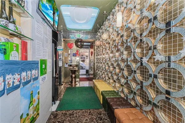 a view of a chairs and table in a room