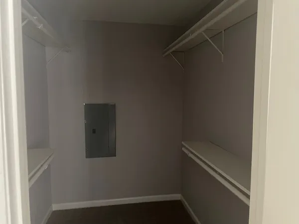 a bathroom with a toilet and shower