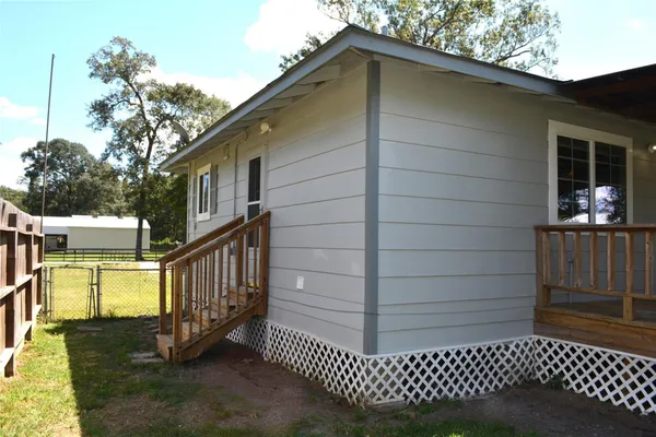 a view of a park with large trees
