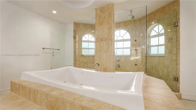 a bedroom with a bed and a chair