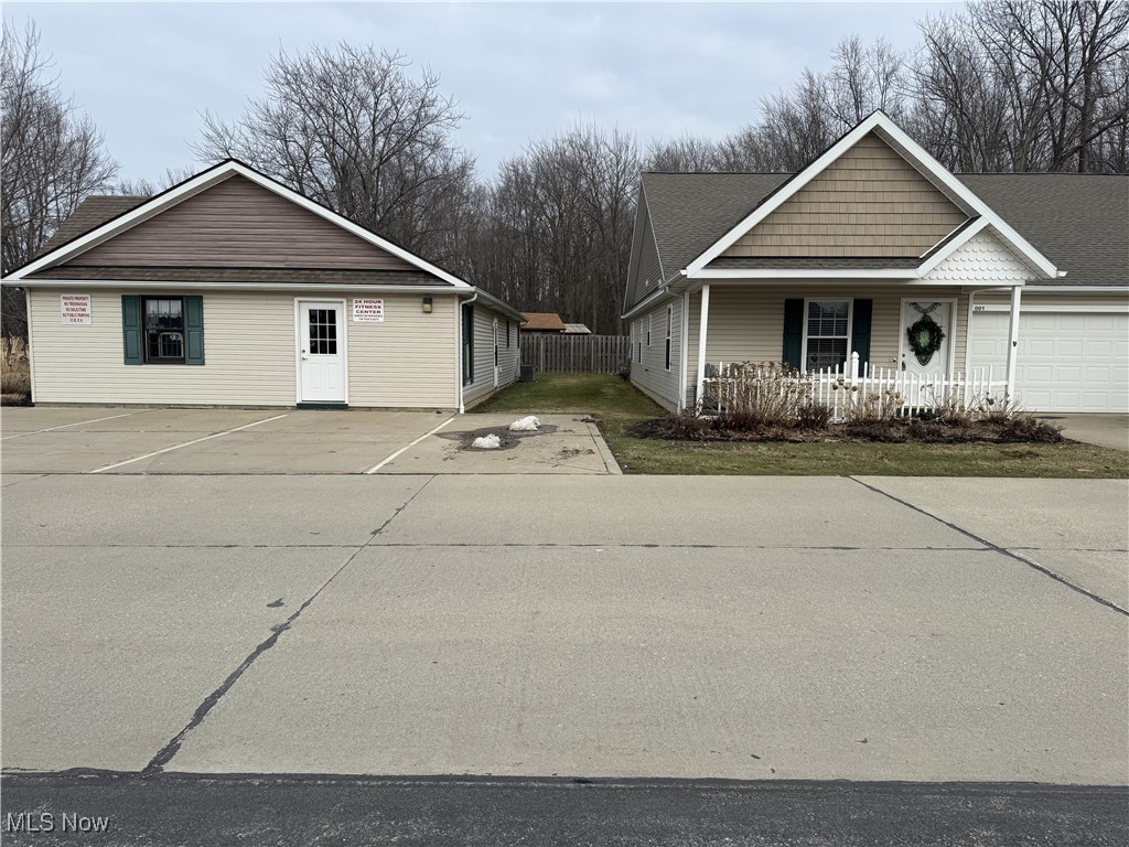 5930 Lake Road West Ashtabula, OH 44004 - Photo 23 of 27 The building to the left of the condo is a community room and exercise room.