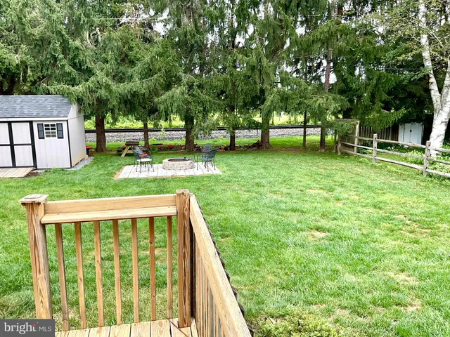 a view of backyard with green space