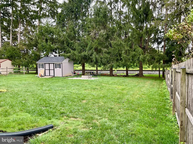 a house view with garden space