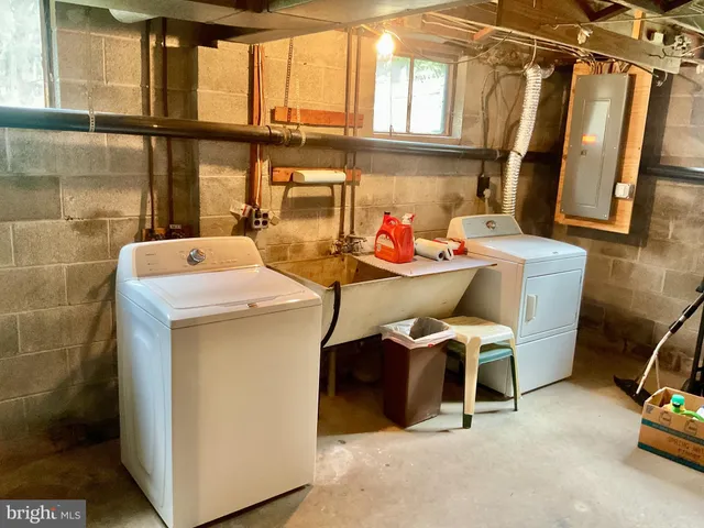 a utility room with dryer and washer