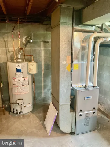 a view of a refrigerator with cabinet