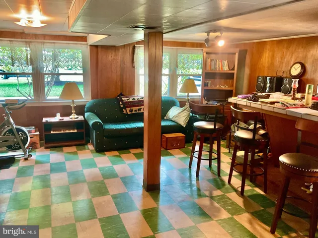 a view of a storage & utility room with a window