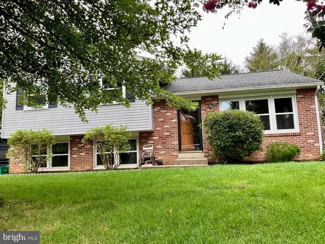 a view of a house with a garden
