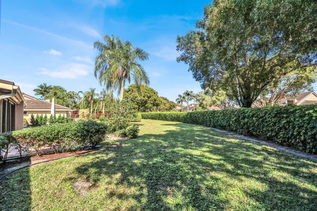 a view of a garden with a lake