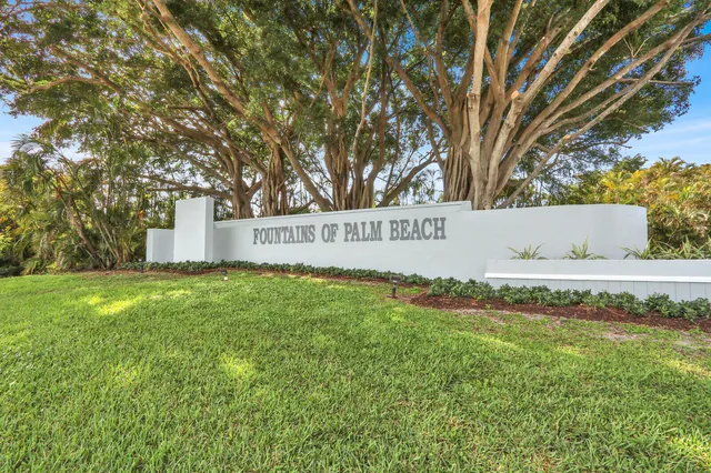 a view of outdoor space with garden and trees