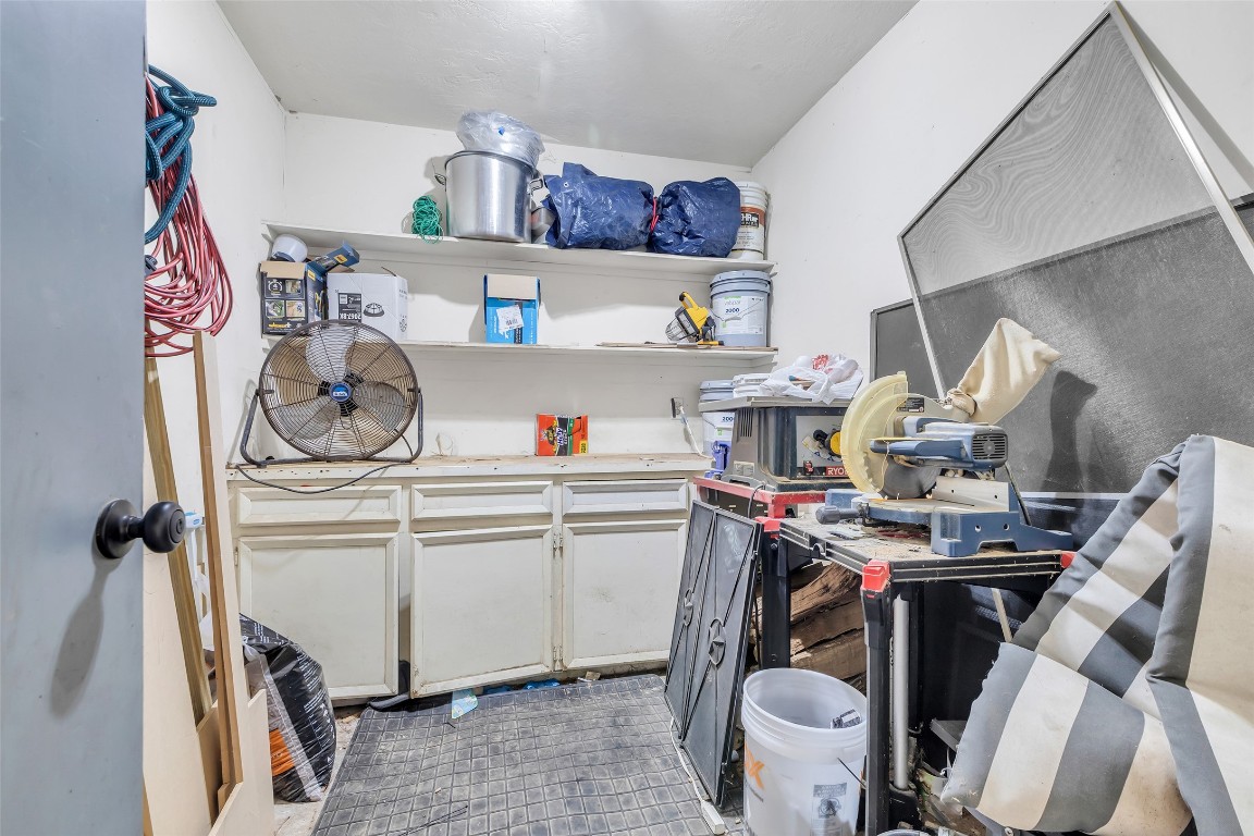 13860 Ventura Road Willis, TX 77318 - Photo 16 of 22 a room with storage and utility