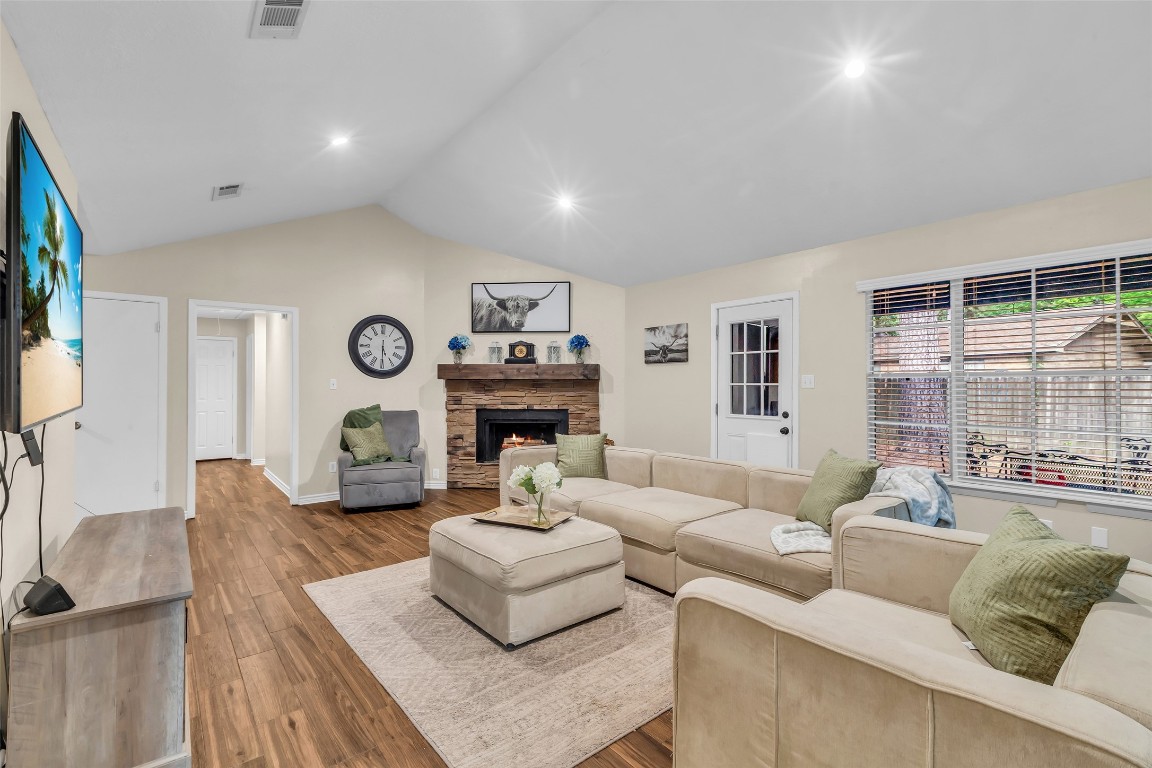 13860 Ventura Road Willis, TX 77318 - Photo 6 of 22 a living room with furniture and a fireplace