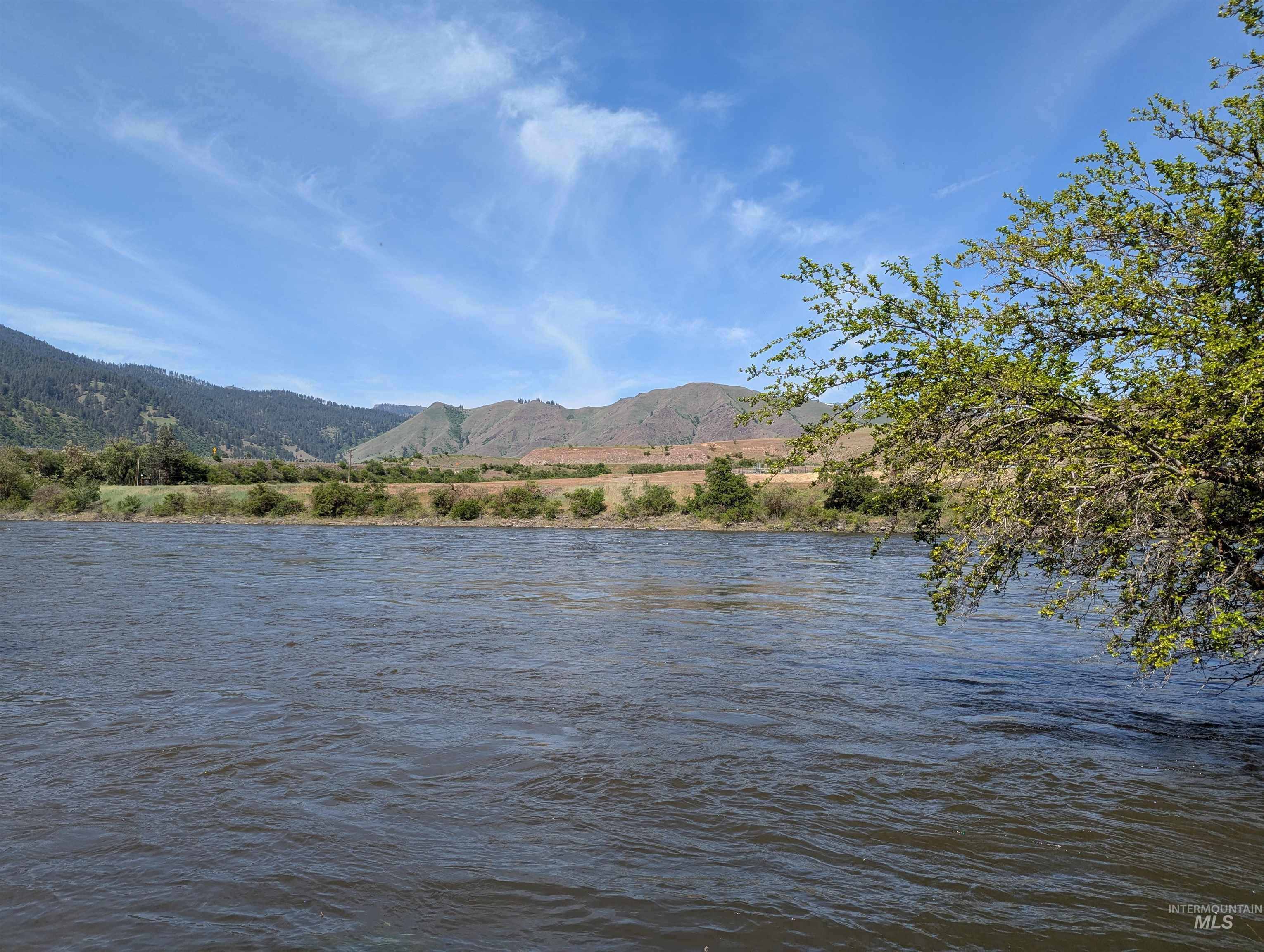 126 Rivers Bend Road White Bird, ID 83554 - Photo 2 of 6 Water view featuring a mountainous background