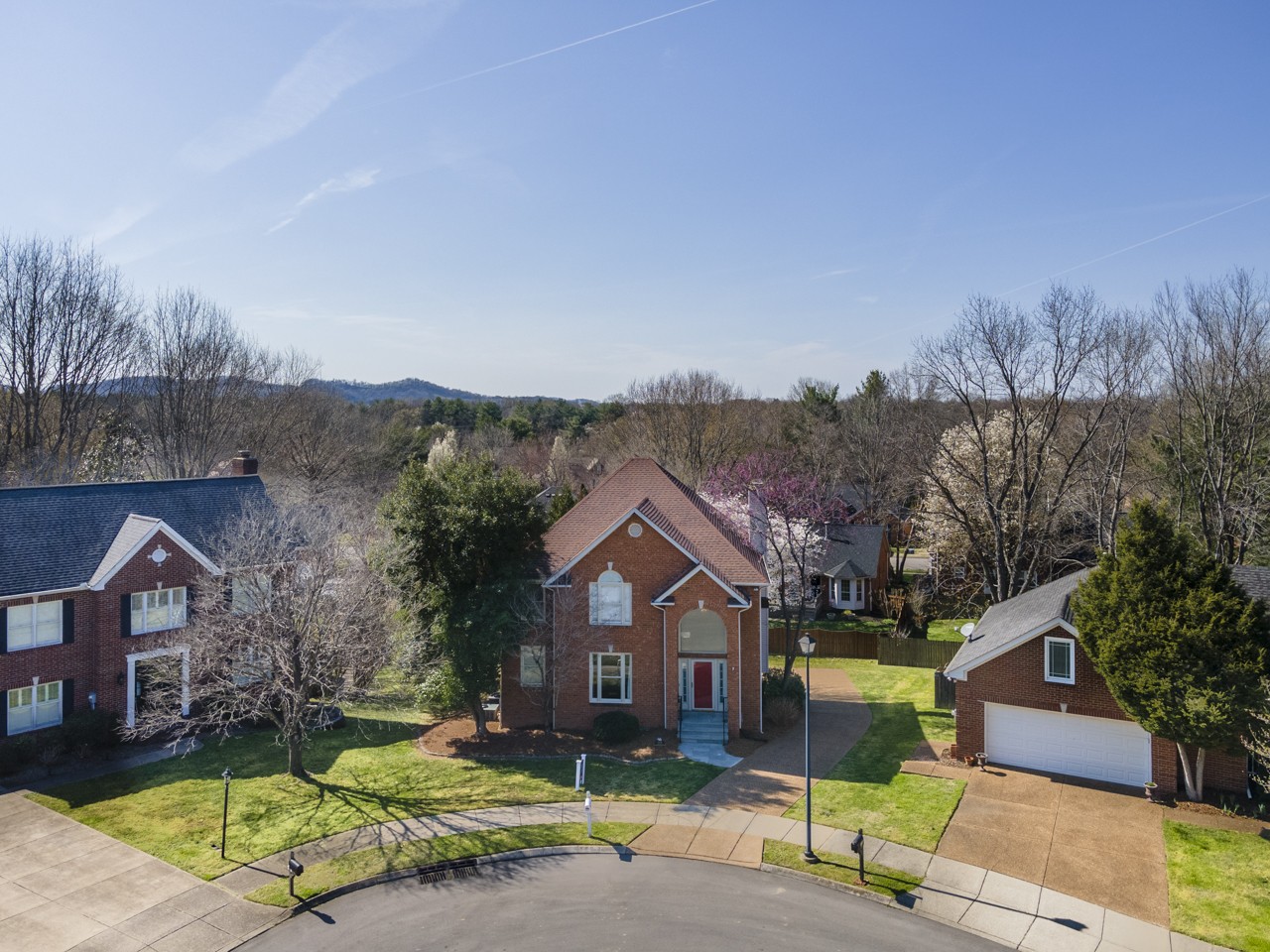 114 Rigby Drive Franklin, TN 37064 - Photo 41 of 55 a front view of a house with a yard and garage