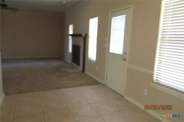 a view of livingroom with hardwood floor and window