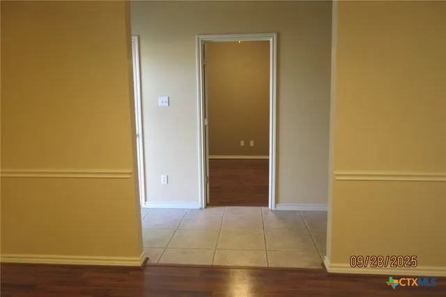 a kitchen with stainless steel appliances granite countertop a stove a refrigerator and a sink