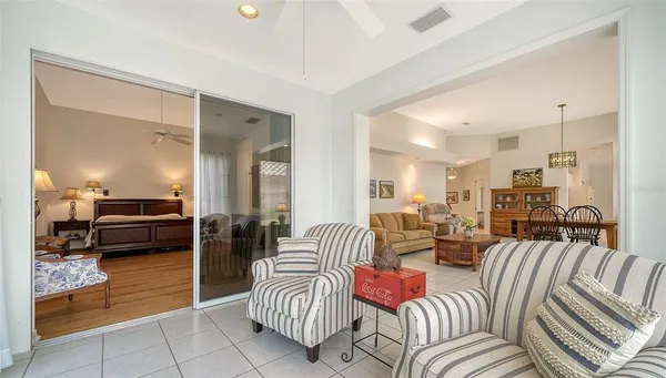 a view of a dining room with furniture window and outside view