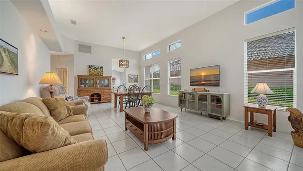 a kitchen with a sink appliances and cabinets