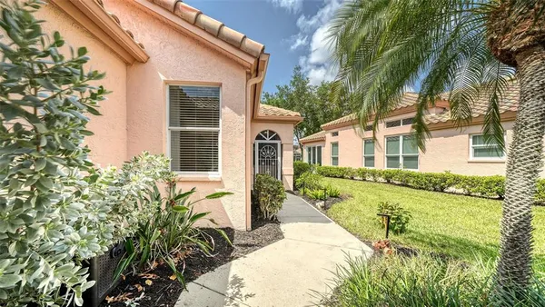front view of a house with a patio