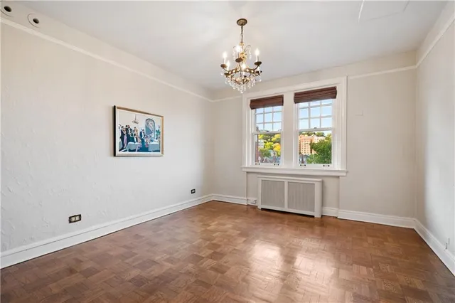 a view of room with window and ceiling fan