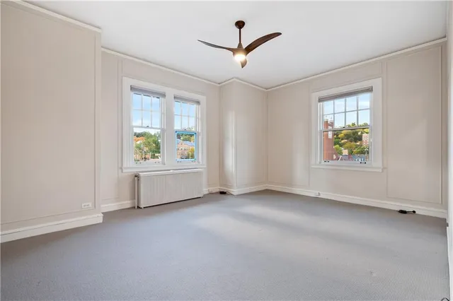 an empty room with windows