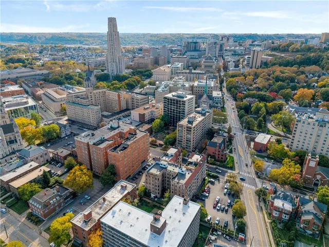 an aerial view of a city with lots of residential buildings