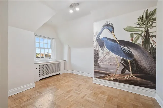 a view of a livingroom with furniture and windows