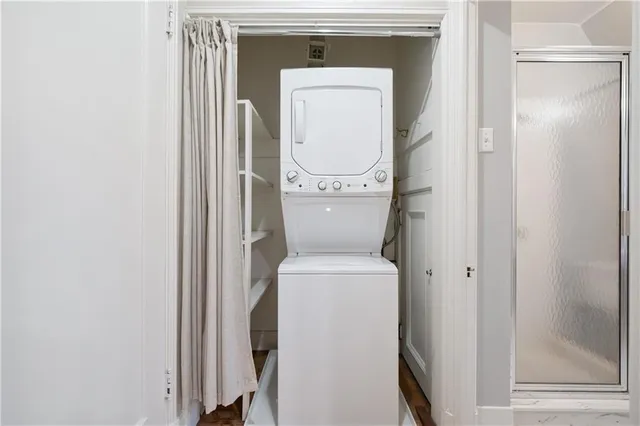 a close view of a utility room with a washer and dryer